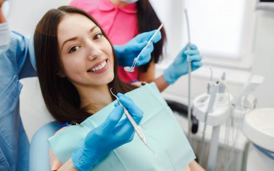 The girl on reception at the dentist Assistant dentist and the patient in the clinic.